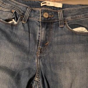 Distressed denim Levi jeans